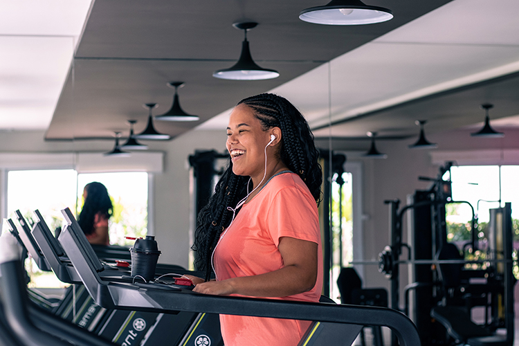 Picture of a young teenage female working out at the gym.