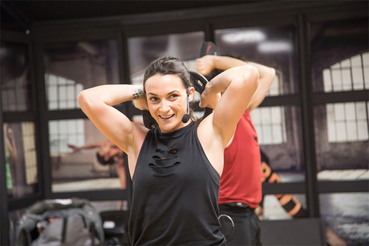 Image of a fitness class instructor taking a class.