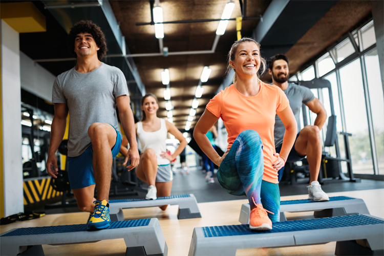 Image of 4 people taking part in a class.