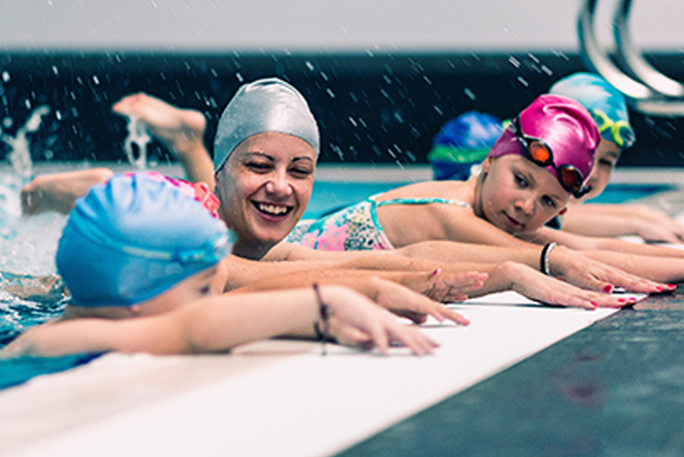 Image of a group of children in a pool