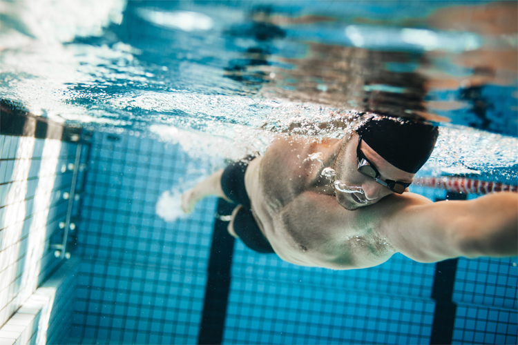 Image of a man swimming.